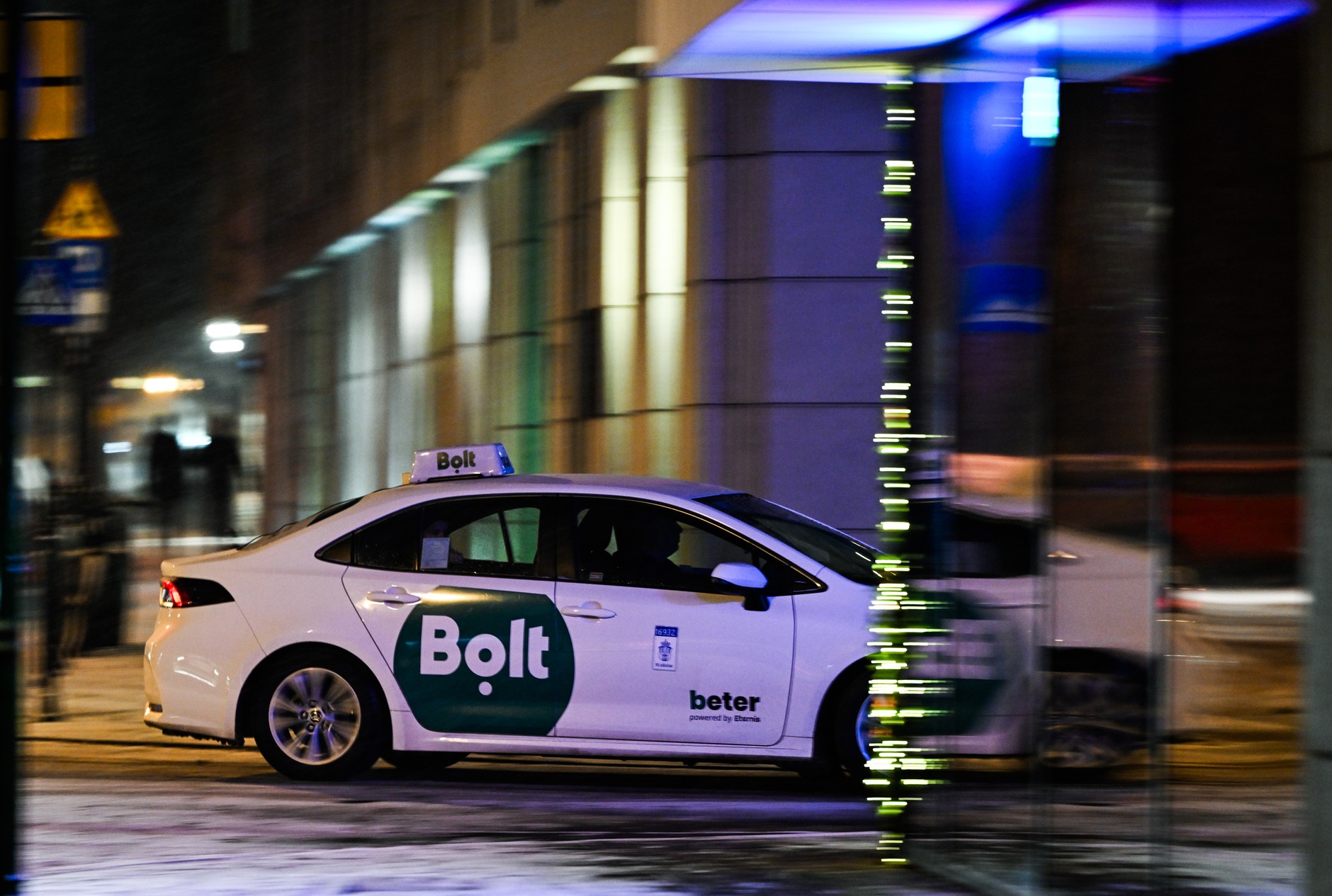 Bolt taxi sign seen on a car in Krakow, Poland, January 6, 2026. 