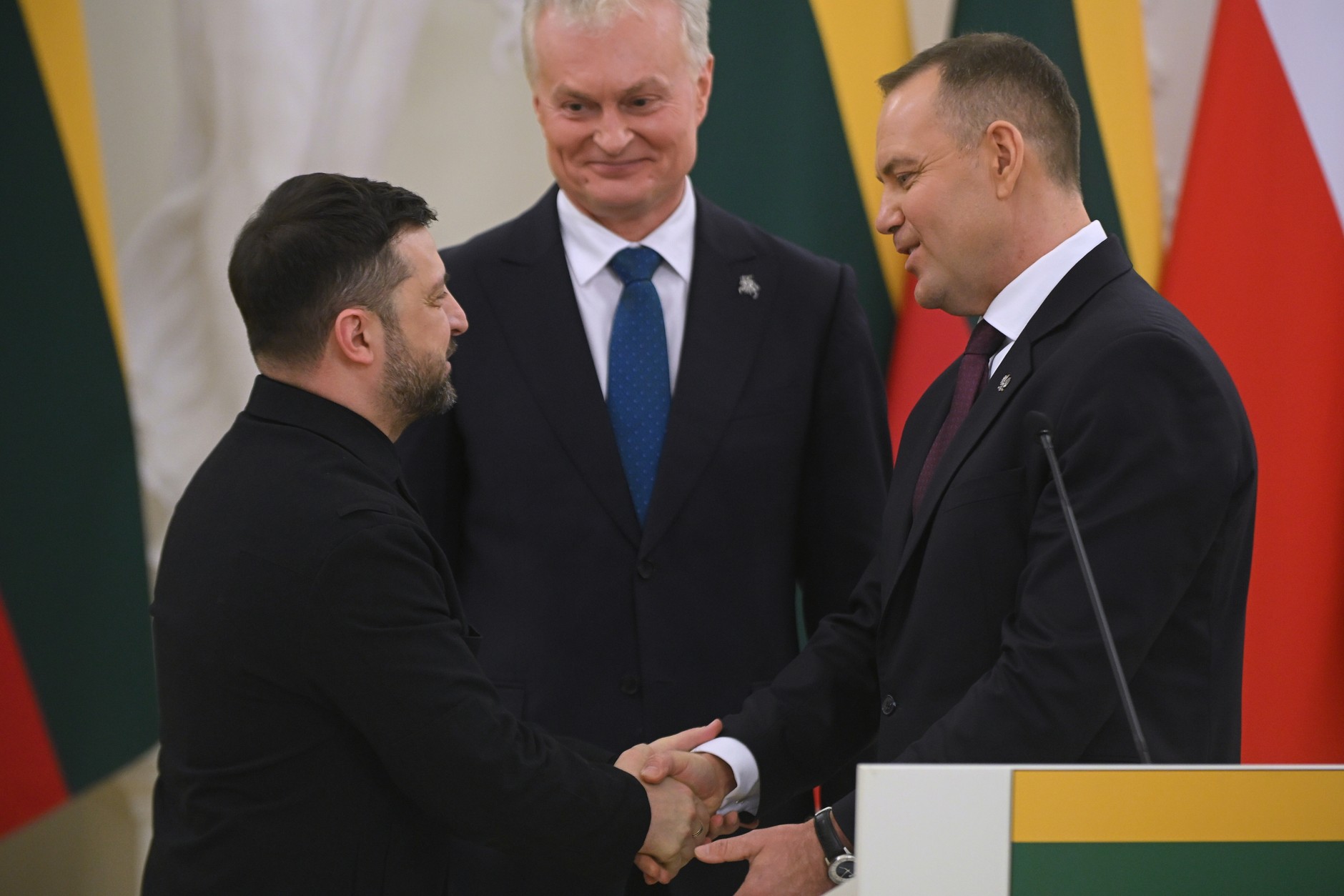 President of Ukraine Volodymyr Zelensky, President of the Republic of Lithuania Gitanas Nauseda and President of the Republic of Poland Karol Nawrocki during a meeting with media representatives at the Presidential Palace in Vilnius, January 25, 2026.