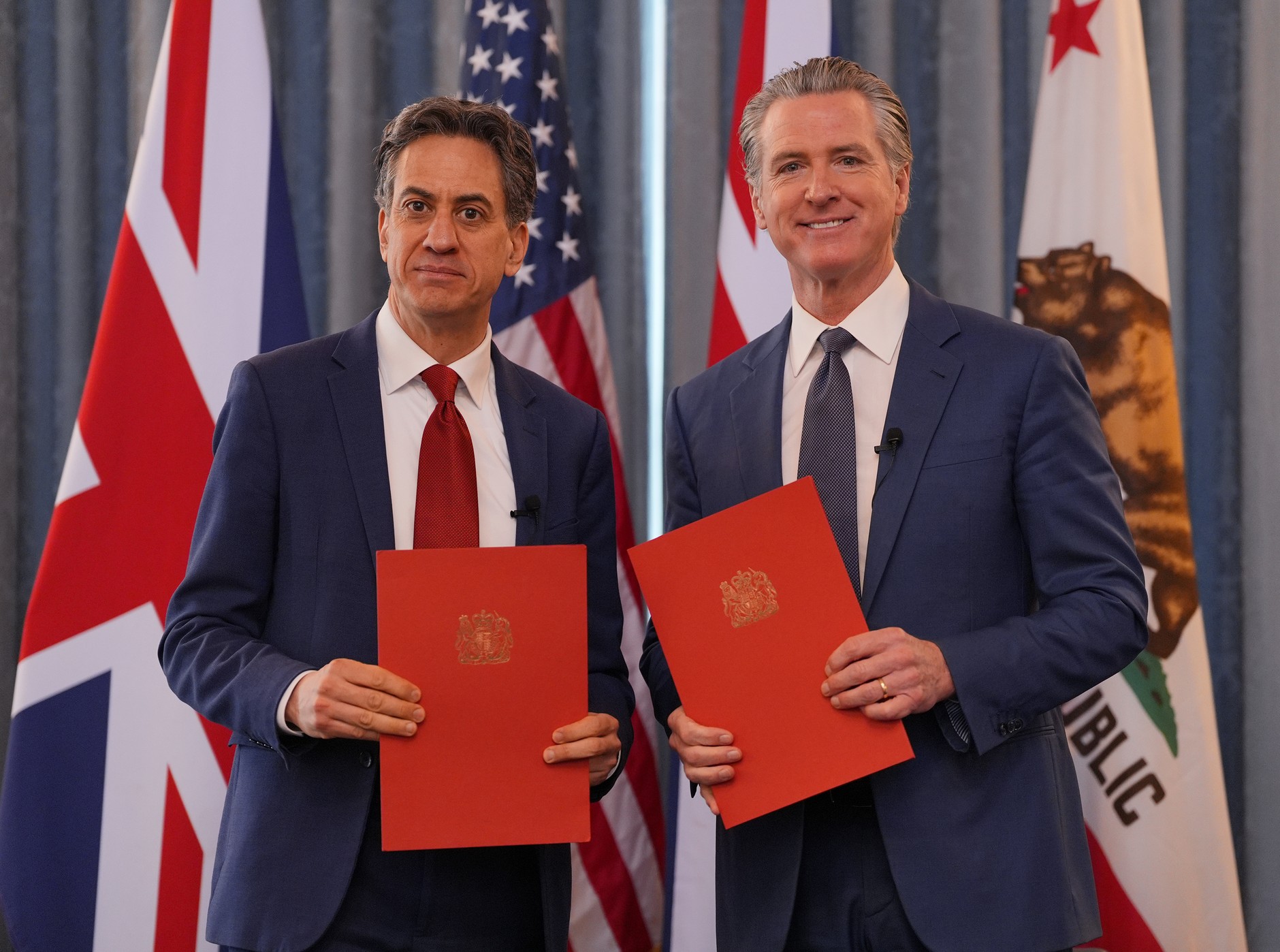 Energy Security Secretary Ed Miliband and California Governor Gavin Newsom sign the Clean Energy Agreement in London, February 16, 2026.