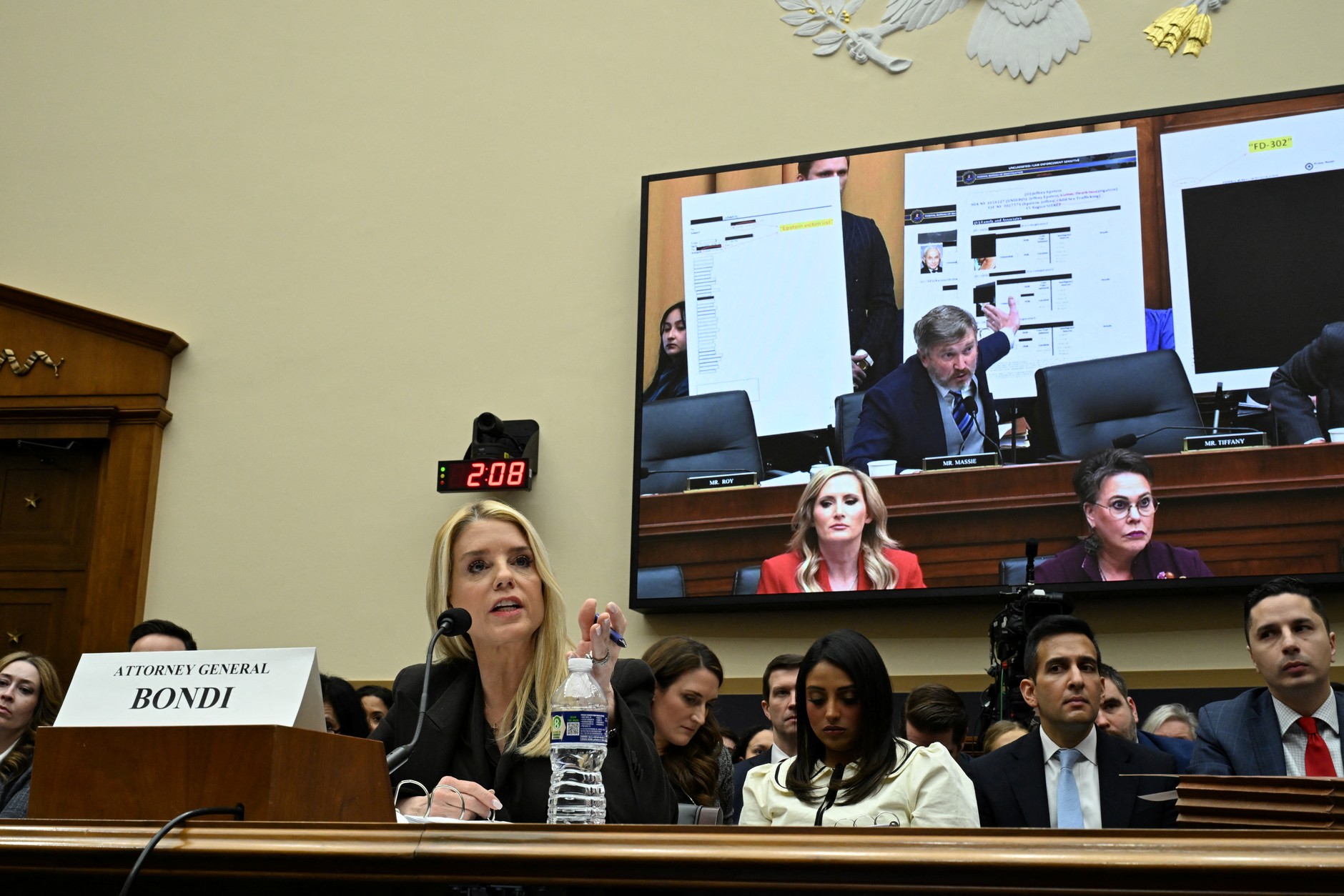 Pam Bondi, Attorney General of the United States. Congressman Thomas Massie appears on the screen. Washington, February 11, 2026