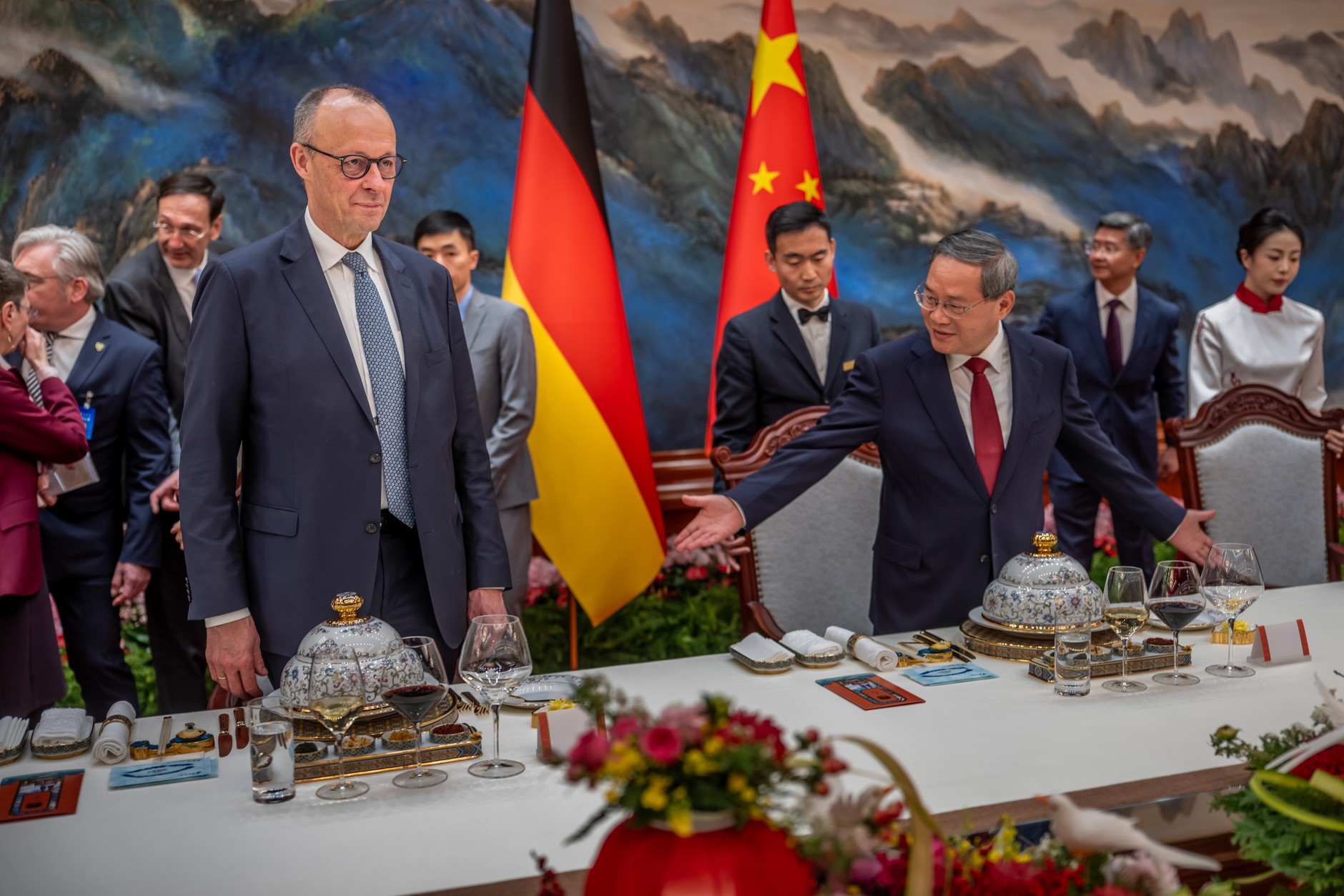 German Chancellor Friedrich Merz (L) and Chinese Prime Minister Li Qiang (R) during lunch at the Great Hall of the People in Beijing, China, February 25, 2026.