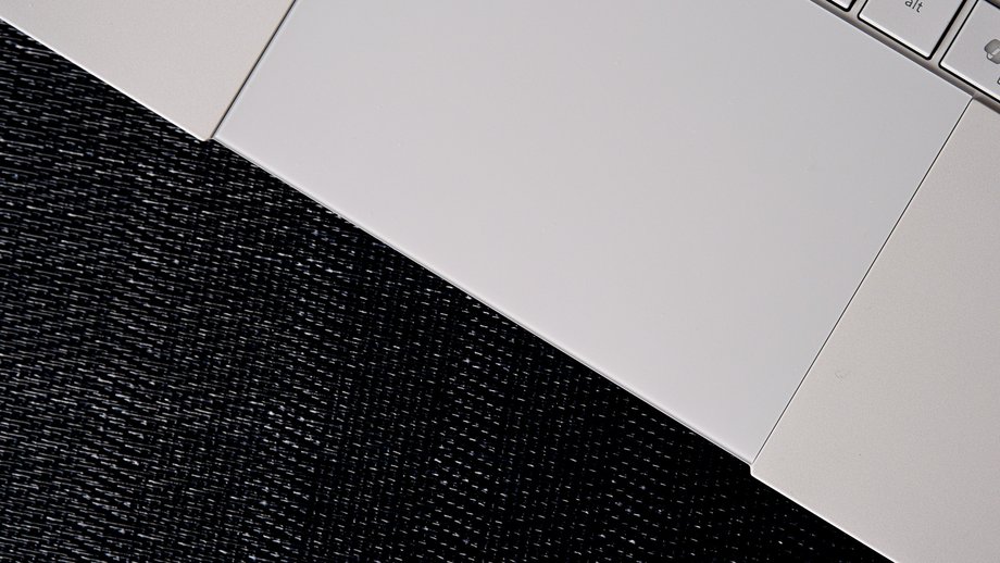 ExpertBook Ultra has an interestingly designed glass haptic trackpad that is not built in at the bottom edge.
