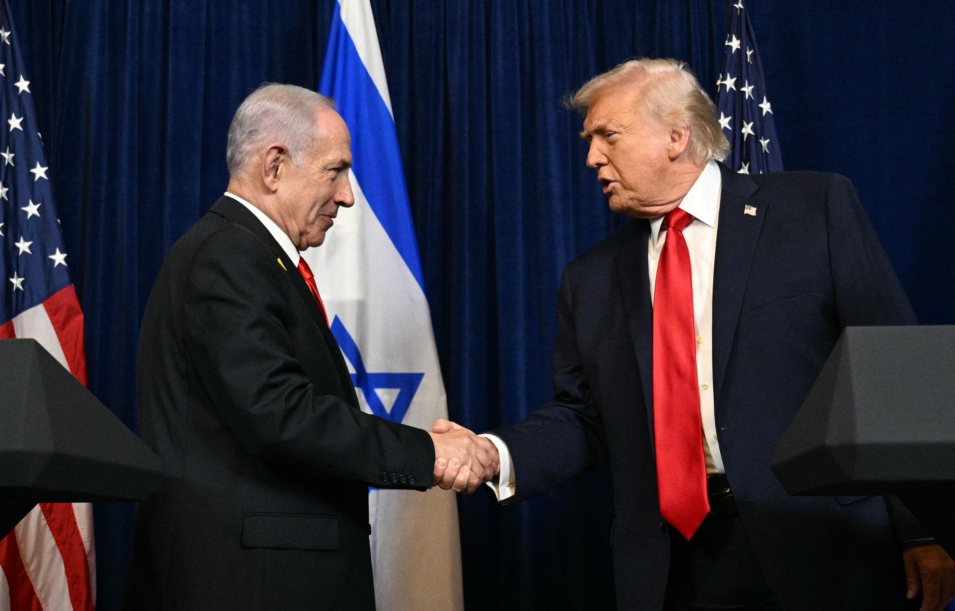 Israeli Prime Minister Binyamin Netanyahu (L) and US President Donald Trump attend a joint news conference at Trump's Mar-a-Lago residence in Palm Beach, Florida, US, December 29, 2025.