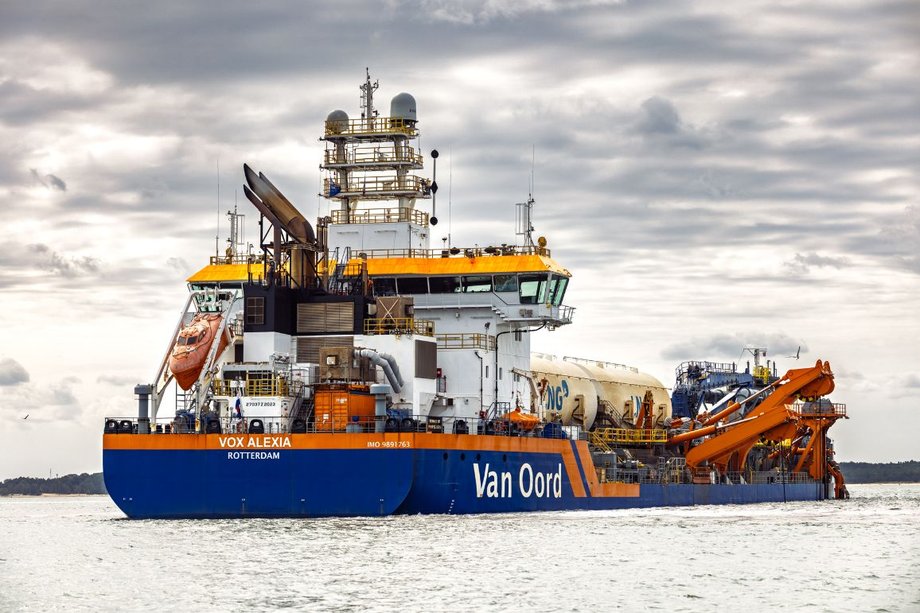 A ship dredging the bottom for the construction of a floating gas terminal (FSRU) in Gdańsk