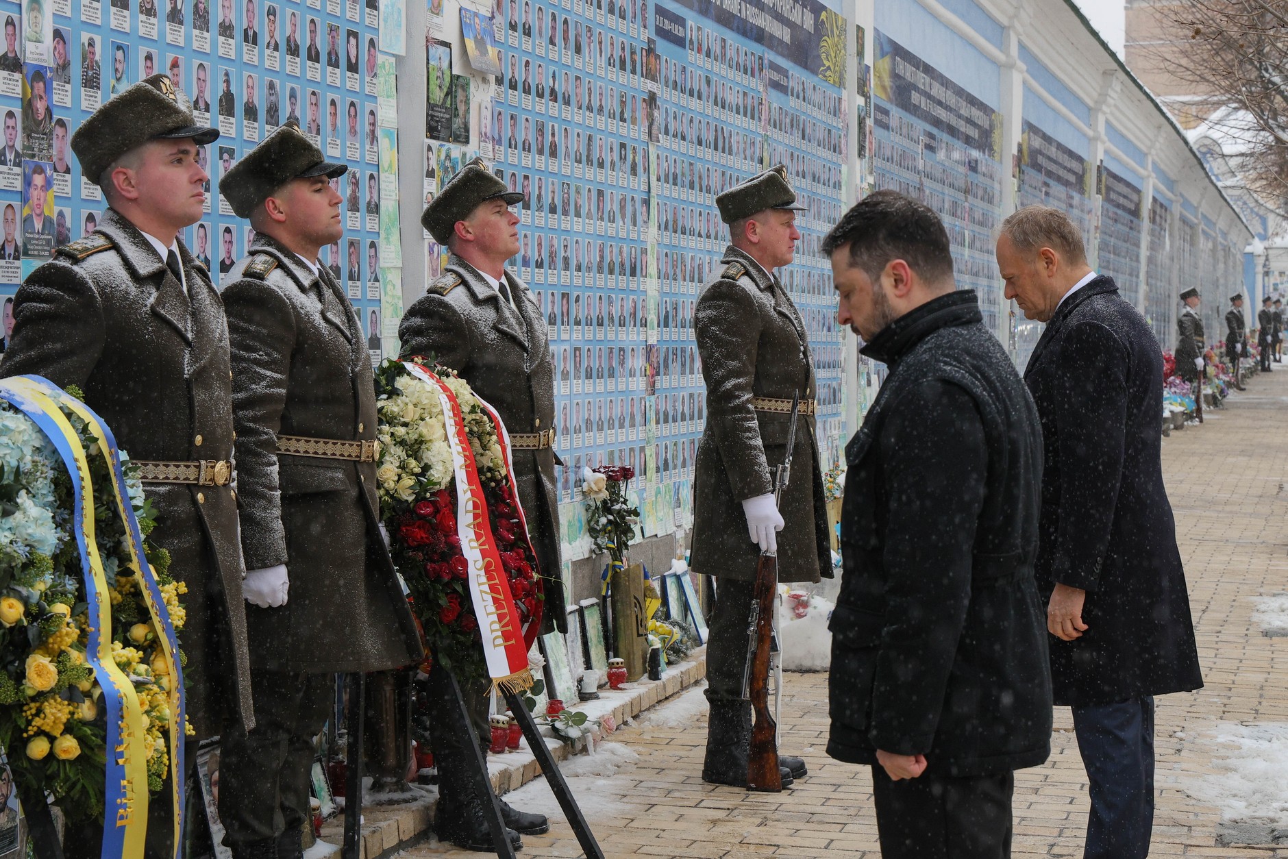 Donald Tusk and Volodymyr Zelensky lay flowers at the Wall of Remembrance for Ukraine's Fallen in Kiev, Ukraine, February 5, 2026.