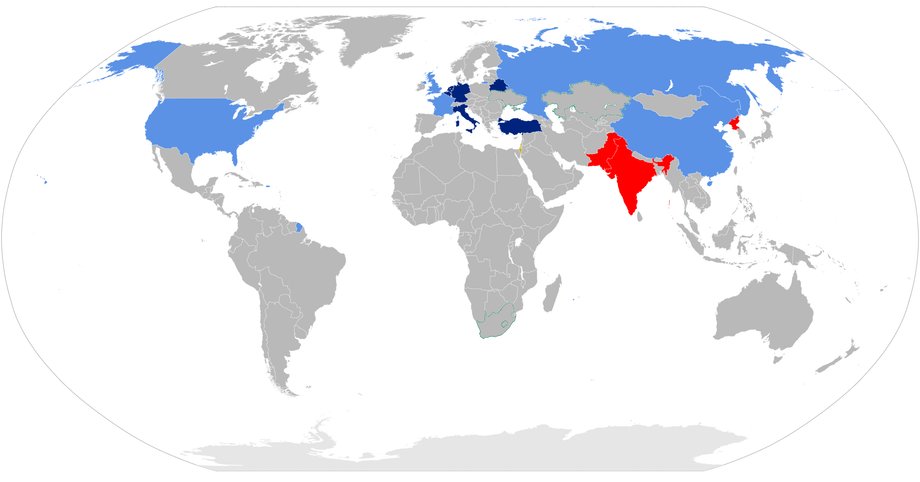 Global map of countries with access to nuclear weapons. Blue - countries possessing nuclear weapons in accordance with international arrangements (China, France, Russia, Great Britain, United States), Navy blue - NATO or CSTO countries covered by the nuclear weapons sharing policy (Belgium, Germany, the Netherlands, Italy, Turkey, Belarus), Red - Other countries possessing nuclear weapons (India, Pakistan, North Korea), Orange - States unofficially possessing nuclear weapons (Israel)