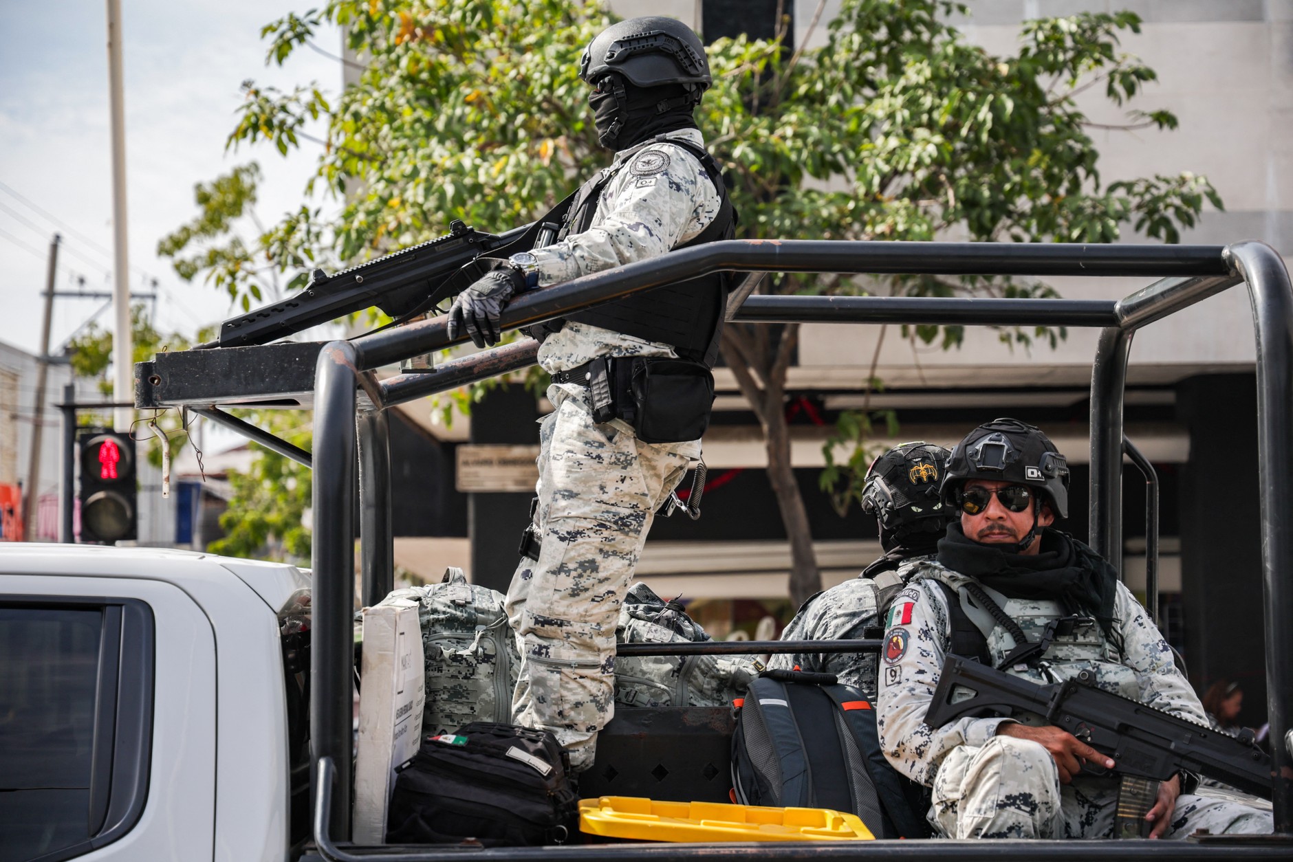 Mexican National Guard officers patrol the streets of Culiacan, Sinaloa, Mexico, on Jan. 30, 2026. Sheinbaum has sent a total of 1,600 additional troops to the state amid escalating violence