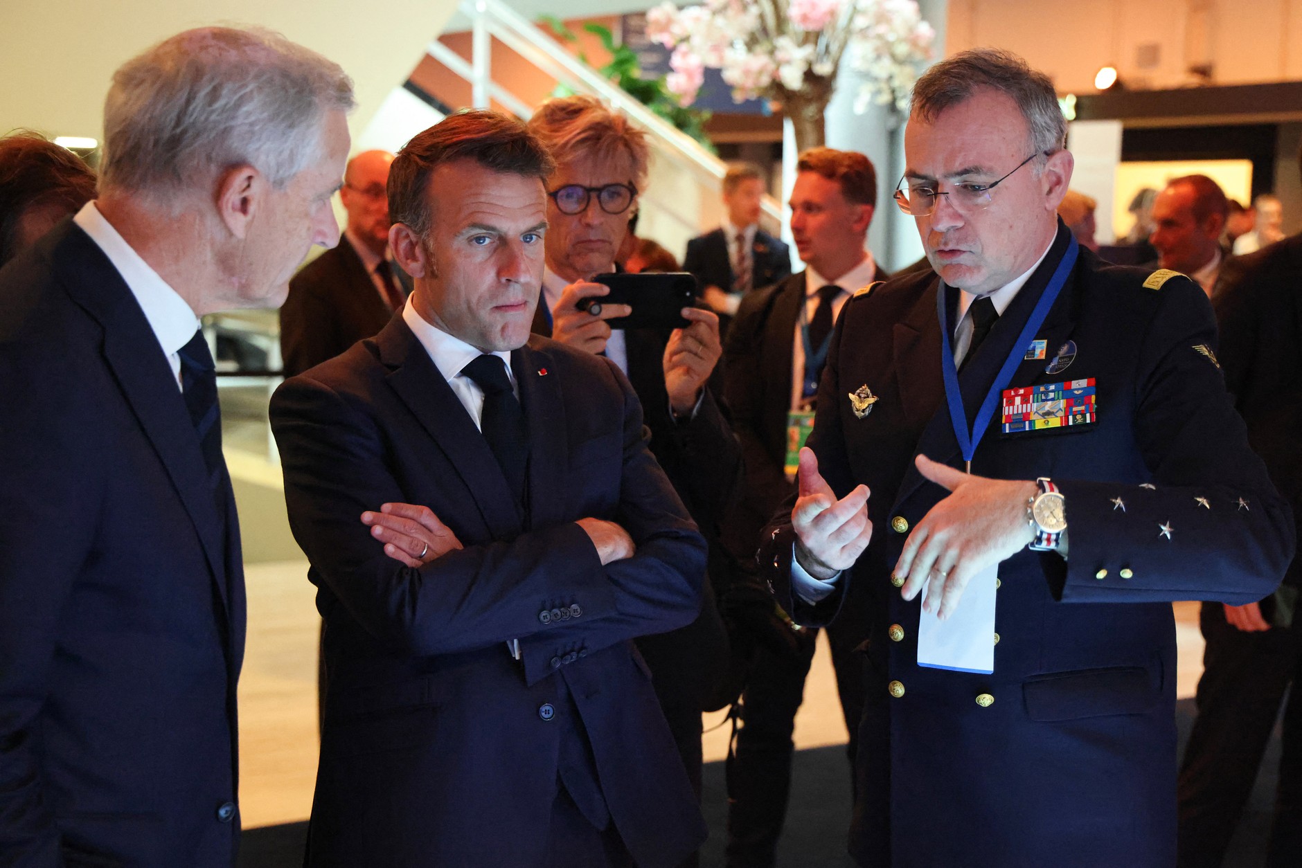From left: Norwegian Prime Minister Jonas Gahr Store, French President Emmanuel Macron and NATO Supreme Commander for Transformation Admiral Pierre Vandier during the NATO Leaders' Summit in The Hague, Netherlands, June 25, 2025. 
