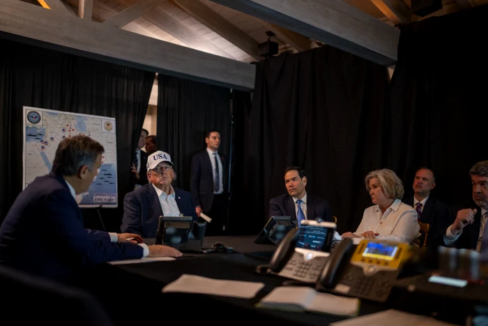 Donald Trump with advisers in the crisis room at Mar-a-Lago PHOTO EPA-EFE