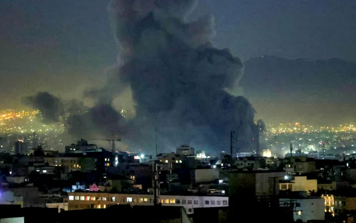 Clouds of smoke rise from missile attacks on Tehran PHOTO: getty images