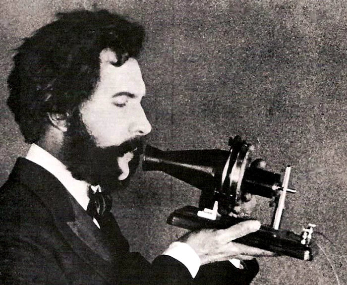 Graham Bell talking on the phone PHOTO: Archives