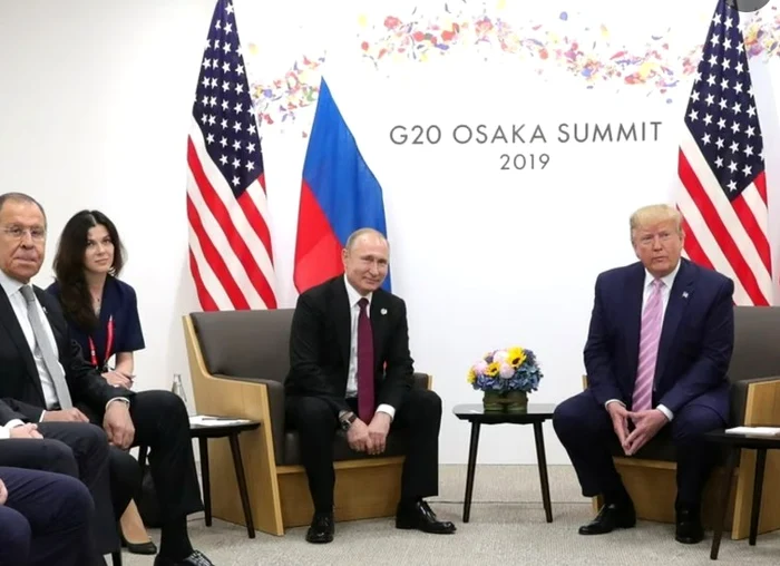Daria Boiarskaia with Putin and Trump at the G20 summit in Tokyo in 2019. Photo: Getty Images