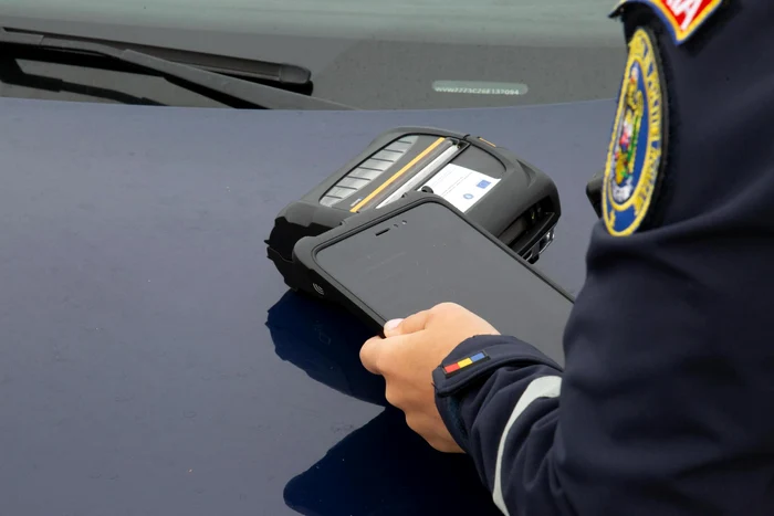 A policeman gives a traffic ticket