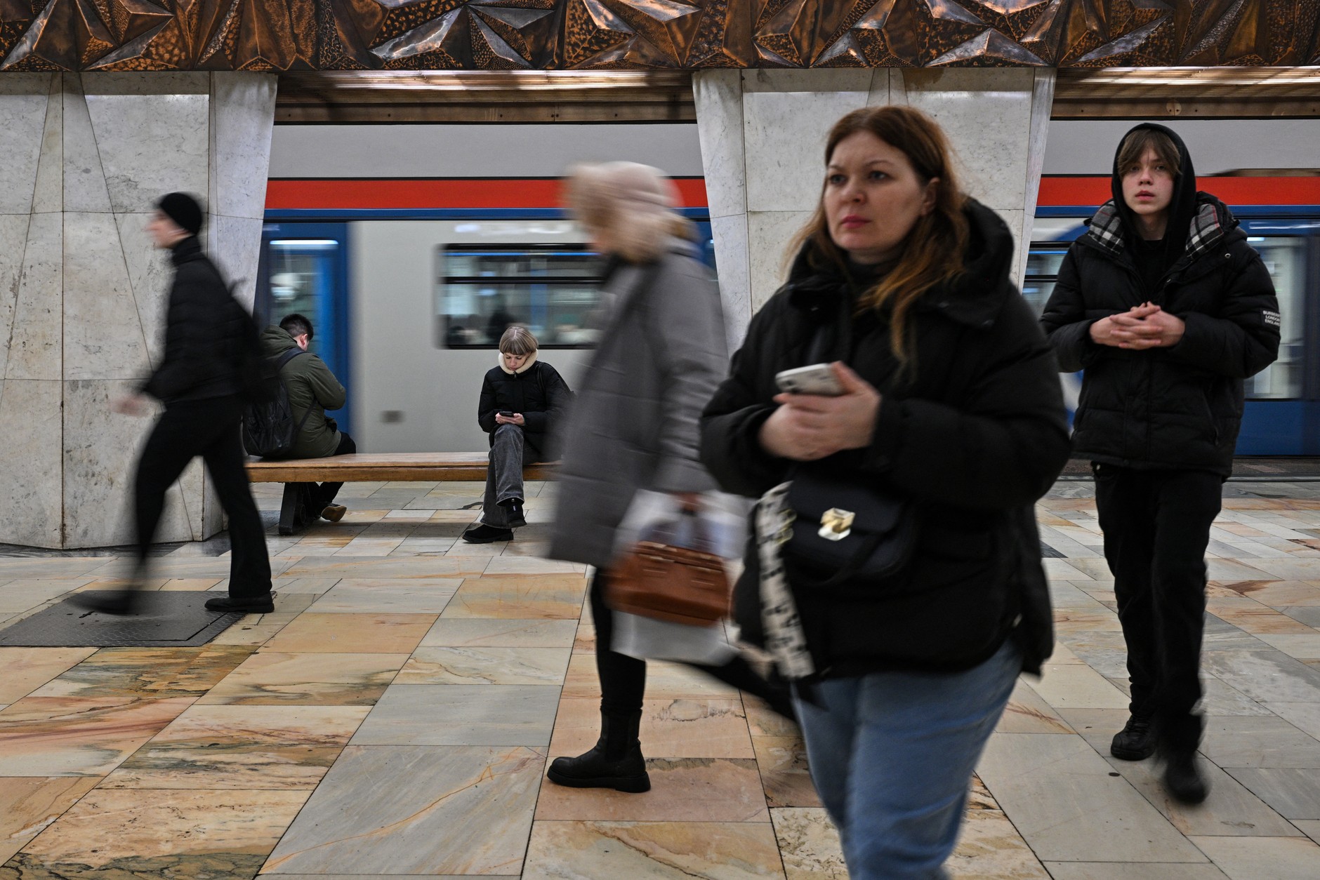 Moscow residents at a metro station, February 12, 2026. 