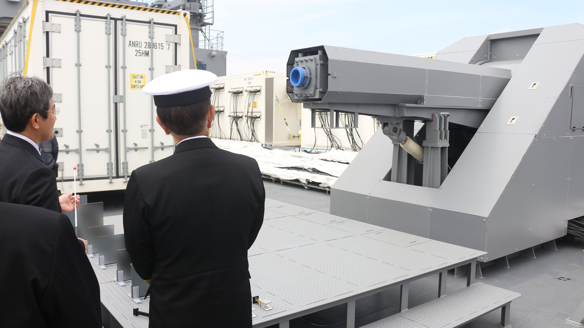 Admiral Saito during a visit to the Asuka ship, where the Japanese railgun is being tested