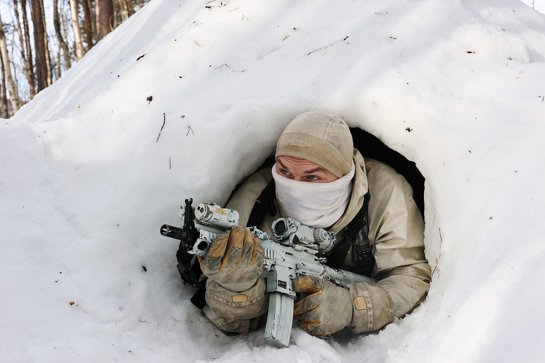A soldier from the Long Range Reconnaissance Squadron of the Intelligence Regiment hiding in a quinzee during Exercise Cold Response