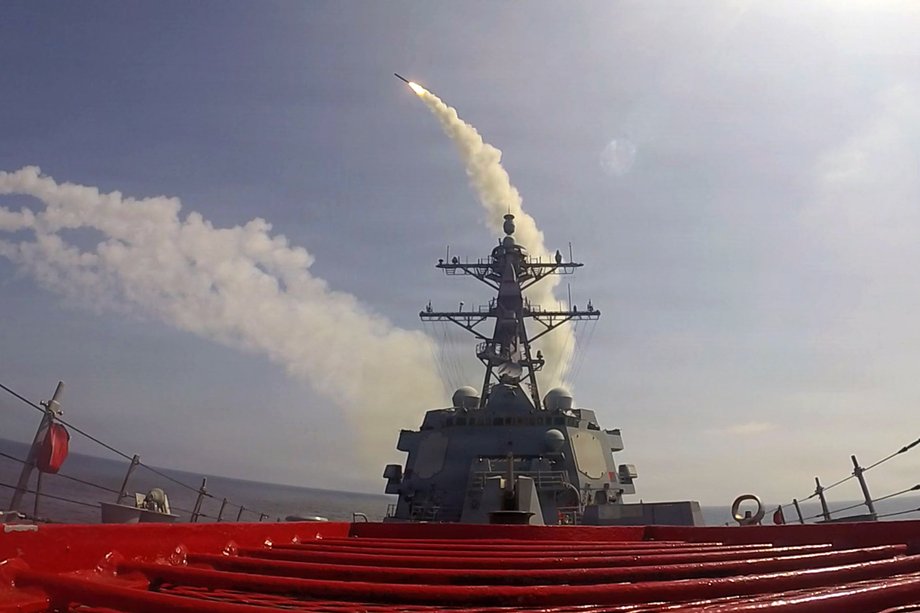 In the photo guided missile destroyer USS Frank E. Petersen Jr. fires a Tomahawk missile during operations in support of Operation Epic Fury, February 28, 2026.