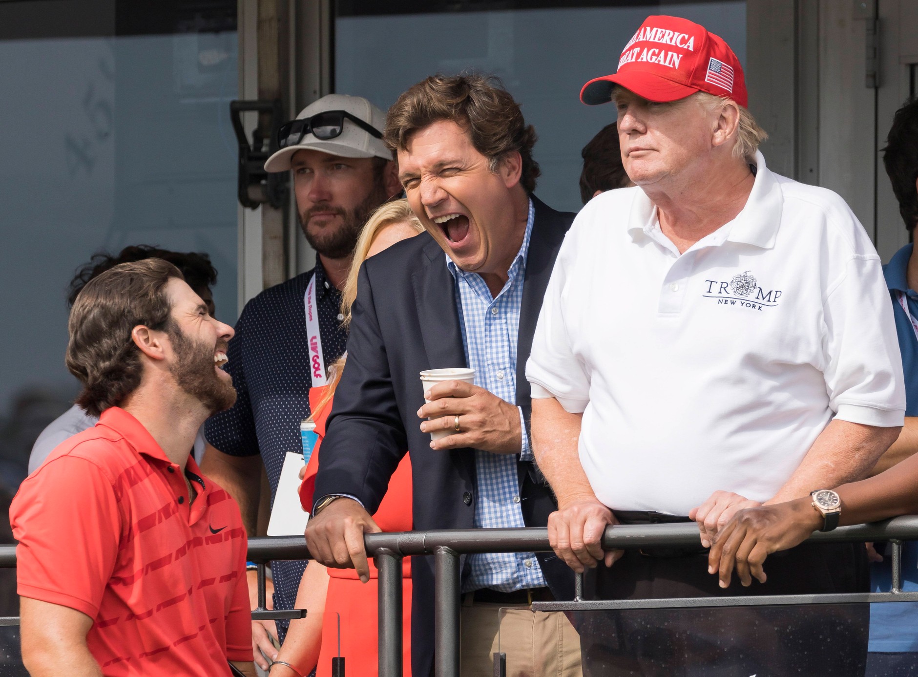 Tucker Carlson and Donald Trump attend a golf tournament at Trump National Golf Club in Bedminster, New Jersey, on July 31, 2022.