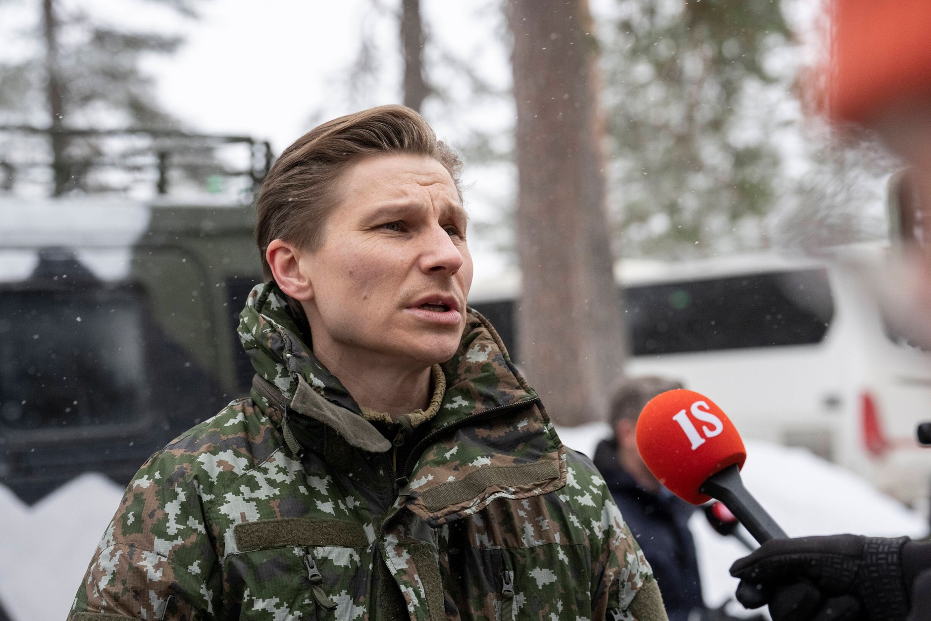 Finnish Defense Minister Antti Hakkanen addresses the media during the NATO Cold Response 26 military exercise in Rovaniemi, Lapland, Finland, March 16, 2026.