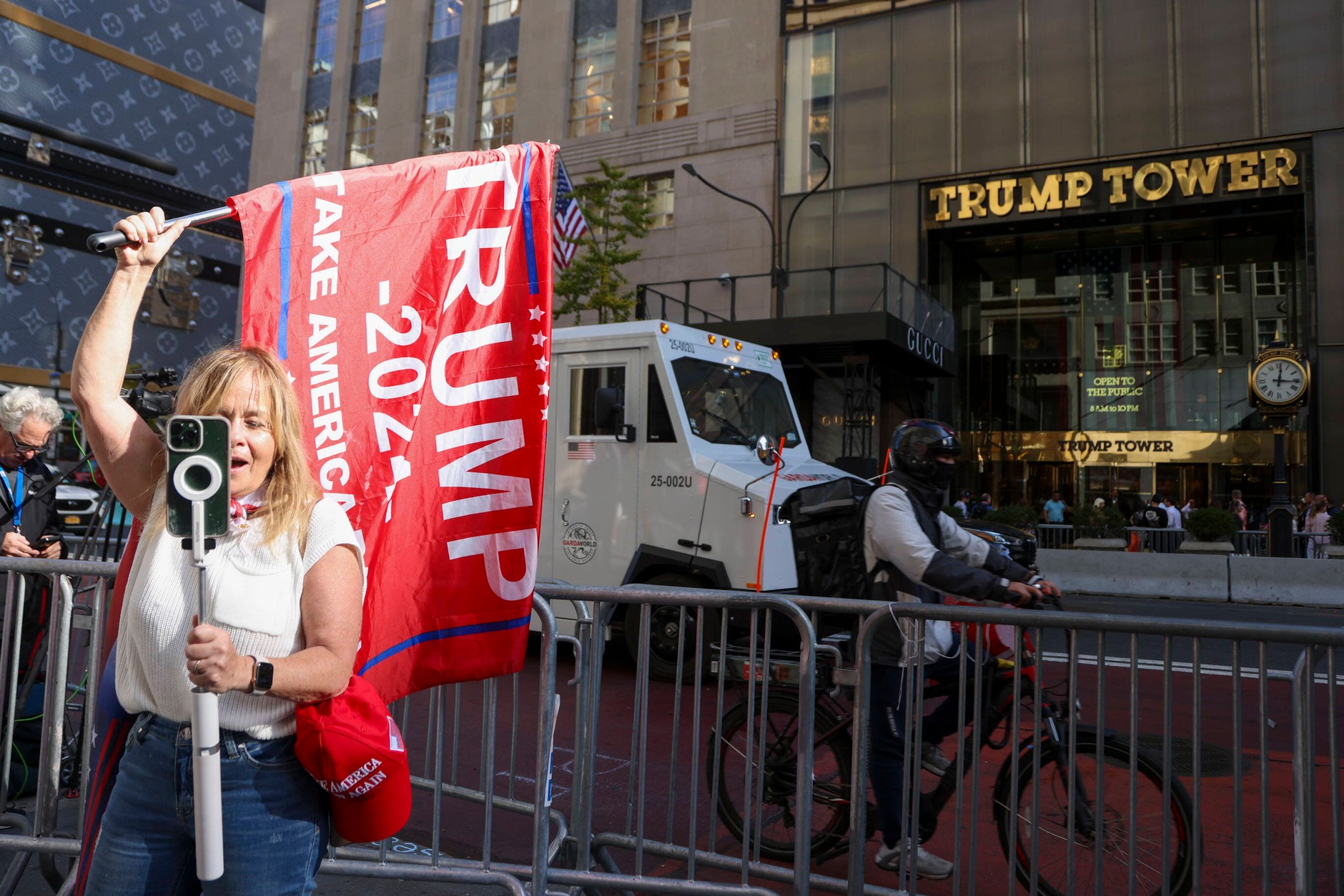 A Donald Trump supporter in front of Trump Tower in New York, November 6, 2024. 