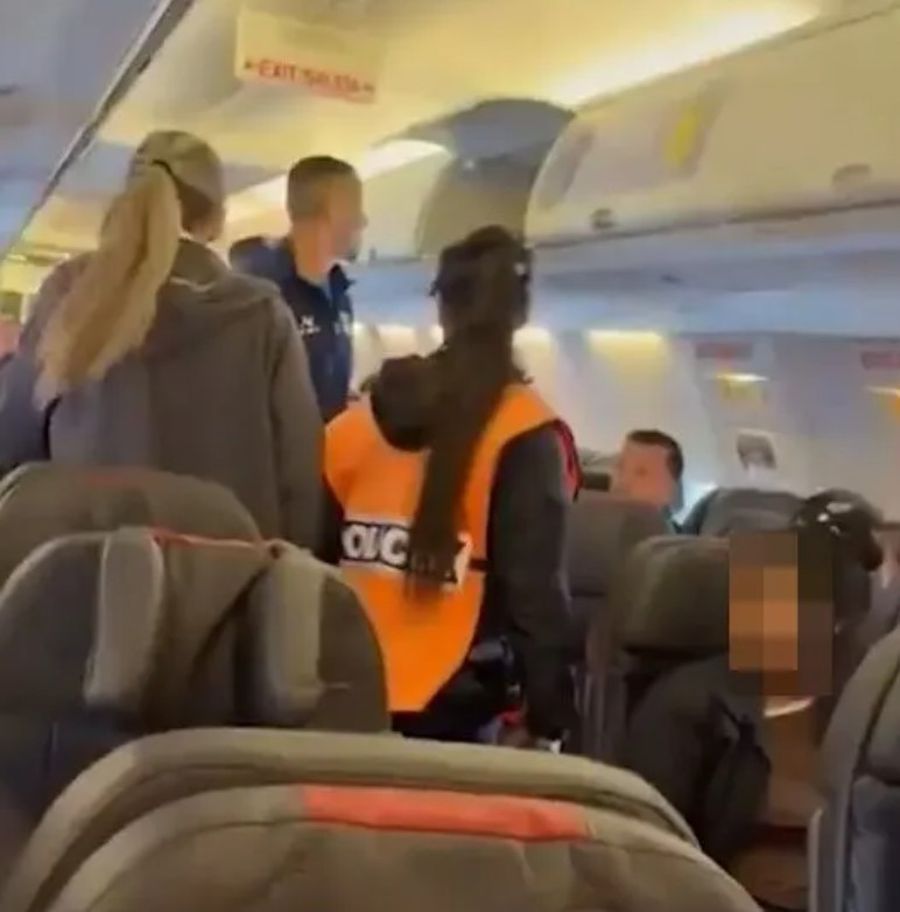 A soccer player shouted on the plane: 