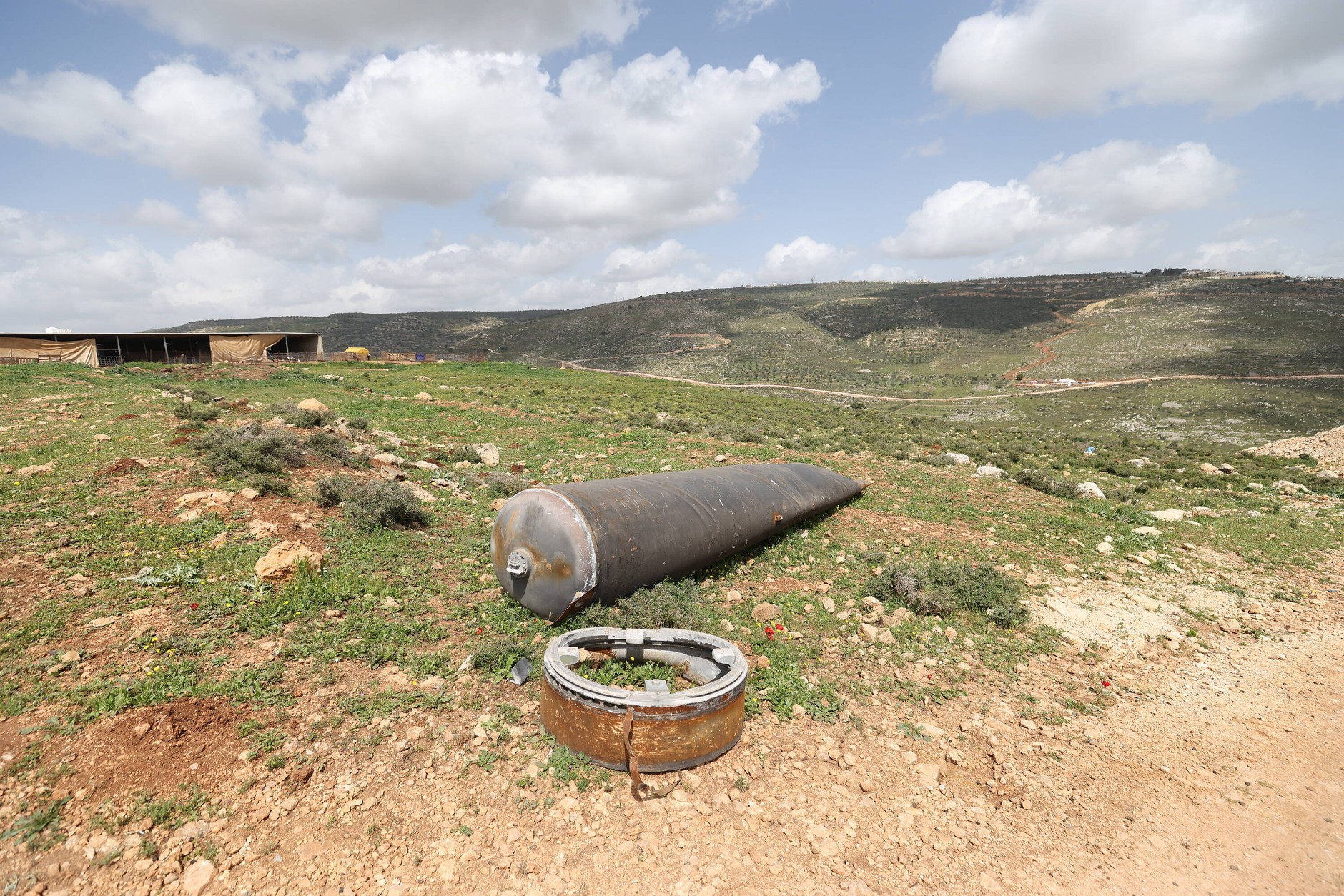 A fragment of an Iranian ballistic missile that fell two weeks earlier near a farm near Al-Luban in the West Bank, April 6, 2026.