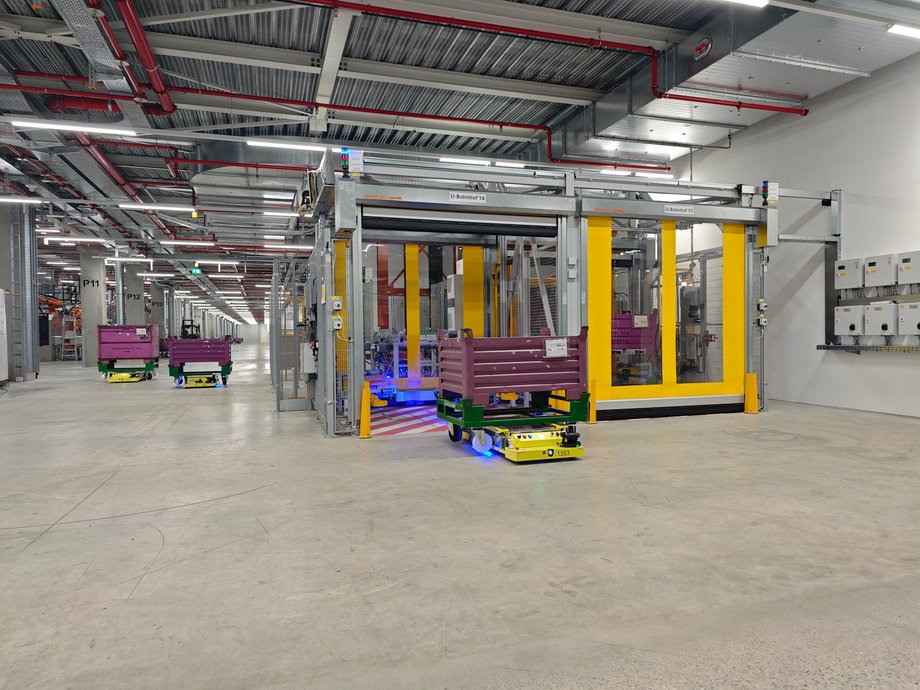 The factory operates not only large robots, but also smaller ones that deliver smaller elements to production lines