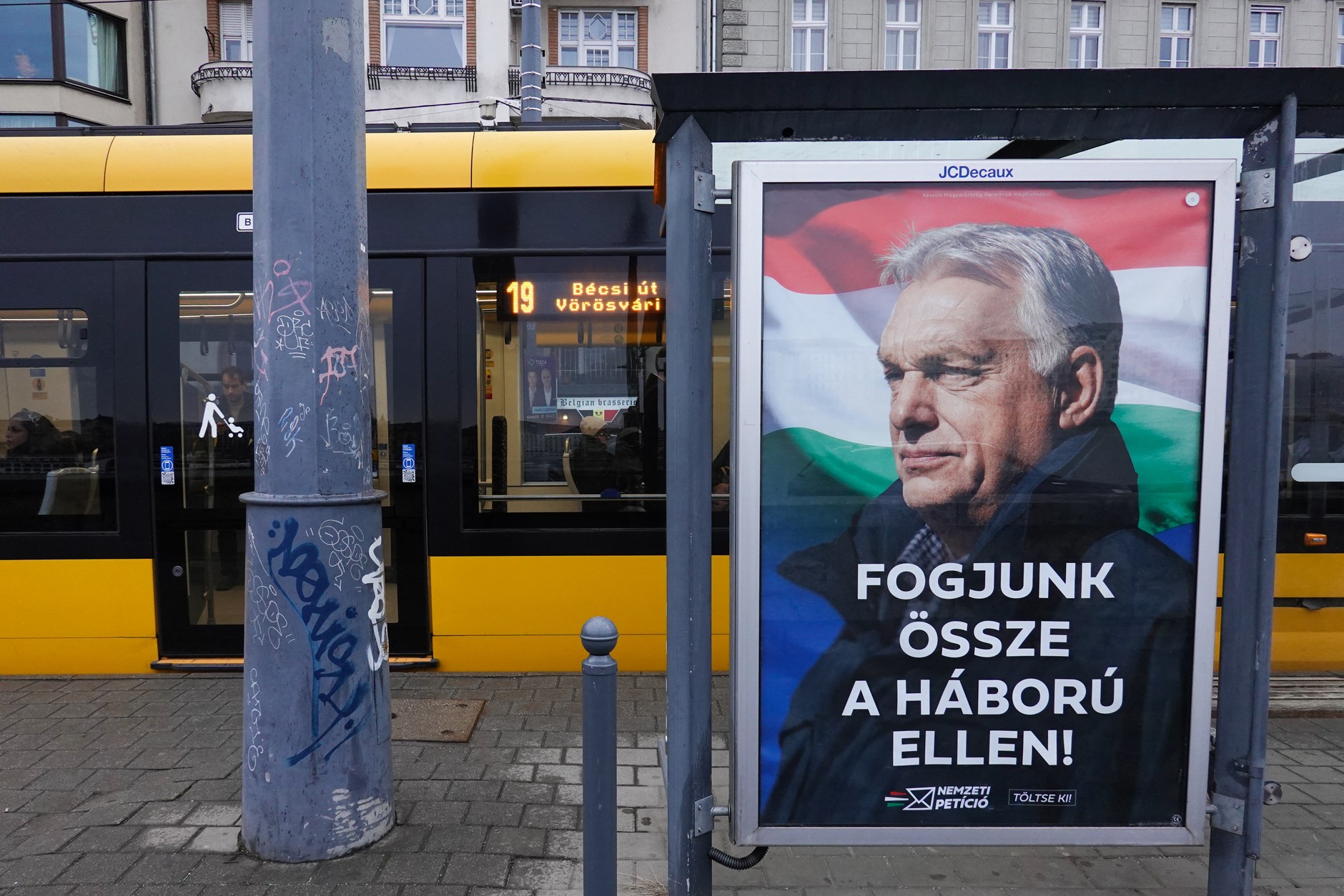 A poster with the image of Hungarian Prime Minister Viktor Orban on a street in Budapest, March 30, 2026.