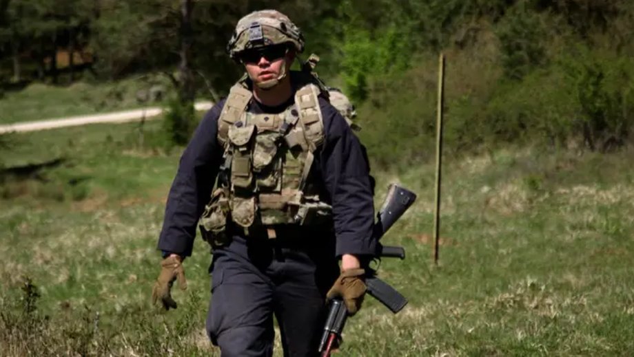 Soldiers from the OPFOR unit wear "black pajamas" and they fight with AK-type rifles