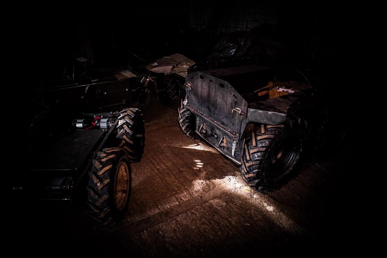Ukrainian soldiers from the Khartia Brigade install unmanned ground systems at a secret location near Kharkov