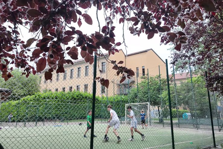 Children on the playground where Federico Dimarco started football