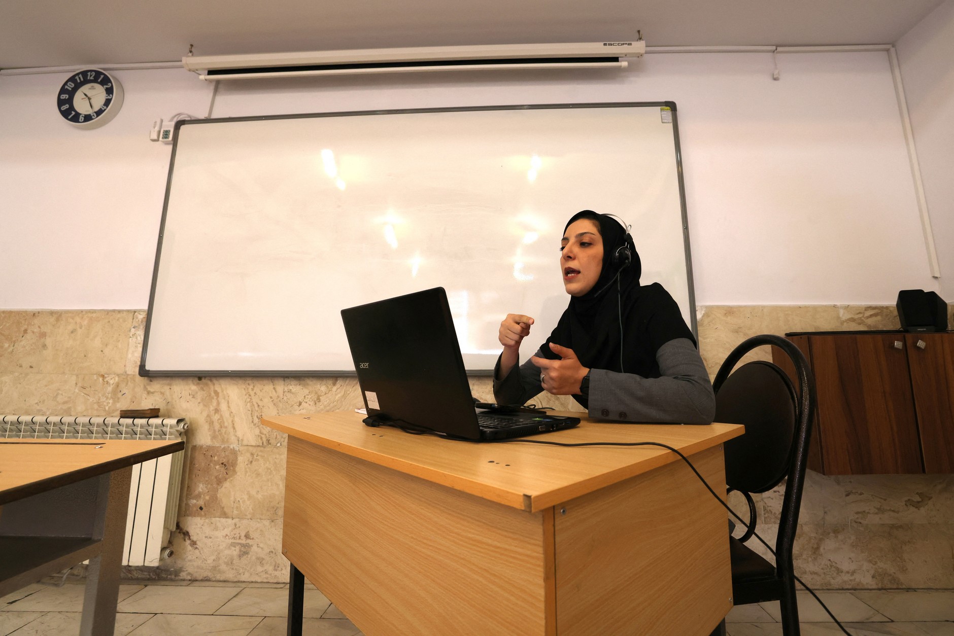 Faezeh Hasarakizad, an Iranian teacher, teaches an online lesson. Tehran, May 11, 2026
