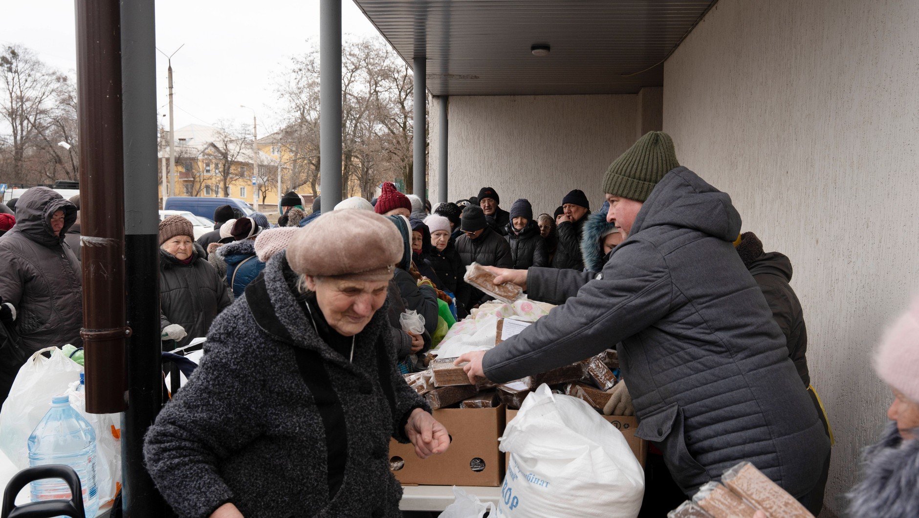 Ukrainian volunteers handing out free humanitarian aid, including food, hygiene products and clothing, to the local community near a church in Kramatorsk, Ukraine, February 17, 2026.