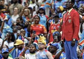 Congolese Fan Statue Makes World Cup Debut Amidst Team Loss — Michel Nkuka Mboladinga's statue debut at the World Cup en