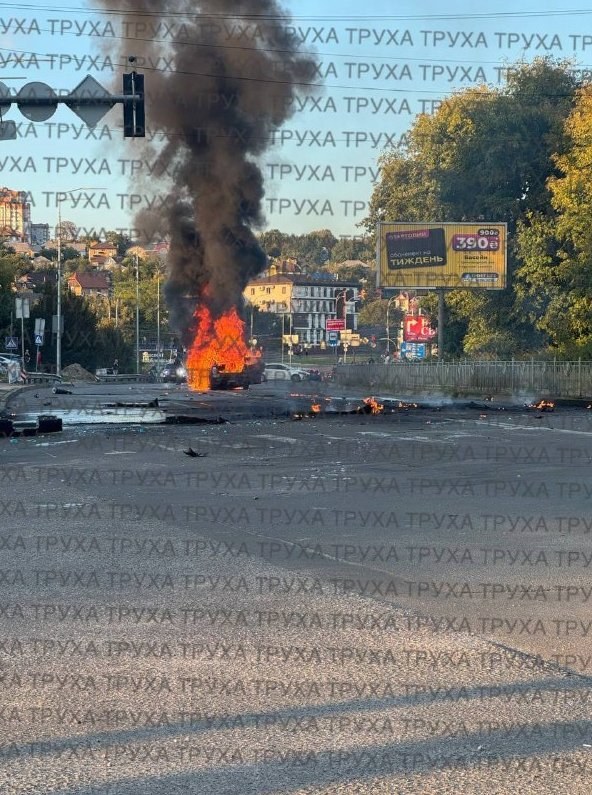 Car Burns in Road Incident Due to Drone Debris in Solomianskyi District — A car is ablaze on a road in Solomianskyi Dist