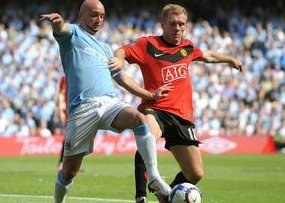 Scholes Responds to Rooney: "I Want My Medal!" — Paul Scholes and Wayne Rooney clash over potential title changes for Ma